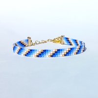 Glass beaded bracelet, summer jewelry of tiny blue, white and gold-color beads, adjustable loom bracelet with lobster claw clasp