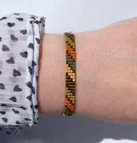 Glass beaded bracelet made with tiny beads in earth tones, stylish adjustable loom bracelet with lobster claw clasp
