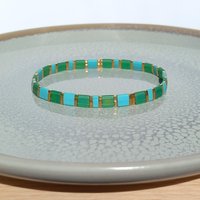 Miyuki tila stretch bracelet, emerald green, turquoise blue and gold-plated tila beads