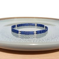 Miyuki tila stretch bracelet in matte dark navy blue and silver, with tila tile beads, tiny rocailles seed beads and thin tube beads