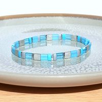 Miyuki tila stretch bracelet, sky blue, silver color and gray tila beads, light colors, sunny summer jewelry