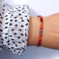 Elegant miyuki tila beads bracelet strung on two strands of transparent stretch cord with dark red, picasso red, terracotta orange and gold-plated tila beads.  Handmade with care and attention to detail and made to order at your size  Available sizes (length): 15cm (5.9in), 16cm (6.3in), 17cm (6.7in), 18cm (7.1in) - make your choice from the drop-down menu when you order.