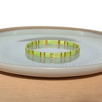 Miyuki tila stretch bracelet in light yellow and chartreuse green colour with gold-plated beads, two bracelets in sunny spring colors