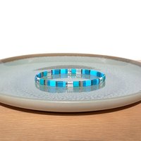 Miyuki tila stretch bracelet, turquoise blue, teal, gray and nickel-plated tila beads