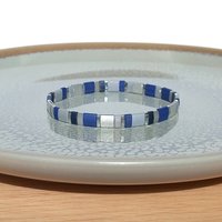 Elegant miyuki beads bracelet strung on transparent stretch cord with tila beads in dark blue, gray and silver color  Handmade with care and attention to detail and made to order at your size