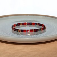 Elegant miyuki tila beads bracelet strung on transparent stretch cord - two strands with Japanese tila beads in transparent picasso ruby red, dark red and gold-plated tila beads  Handmade with care and attention to detail and made to order at your size  Available sizes (length): 15cm (5.9in), 16cm (6.3in), 17cm (6.7in), 18cm (7.1in) 