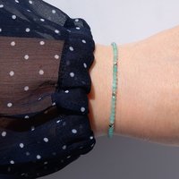 Thin gem bracelet with tiny faceted light blue-green jade and silver-plated cube-shaped beads, stainless steel lobster claw clasp