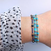 Thin miyuki stretch bracelets with blue crystal pearls, matte tiny glass beads and gold color beads, two designs in minimalist style