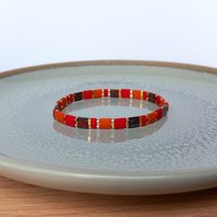 Elegant stretch miyuki bracelet, dark red, picasso red, orange and gold-plated tila beads