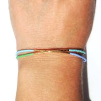Thin miyuki wrapped stretch bracelet with blue, green and gold-plated tiny beads, minimalist summer jewelry