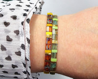 Miyuki tila stretch bracelet in chartreuse green, warm yellow and topaz colour with gold-plated beads, two designs for stacking or as a single bracelet