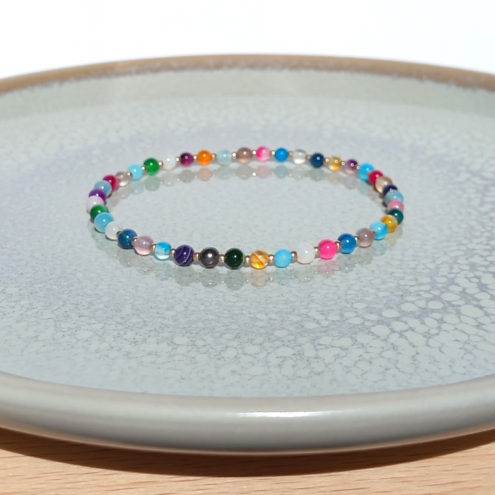 Thin colorful agate bracelet on stretch cord, rainbow colors with champagne coloured tiny miyuki rocailles, multicolored happy bracelet