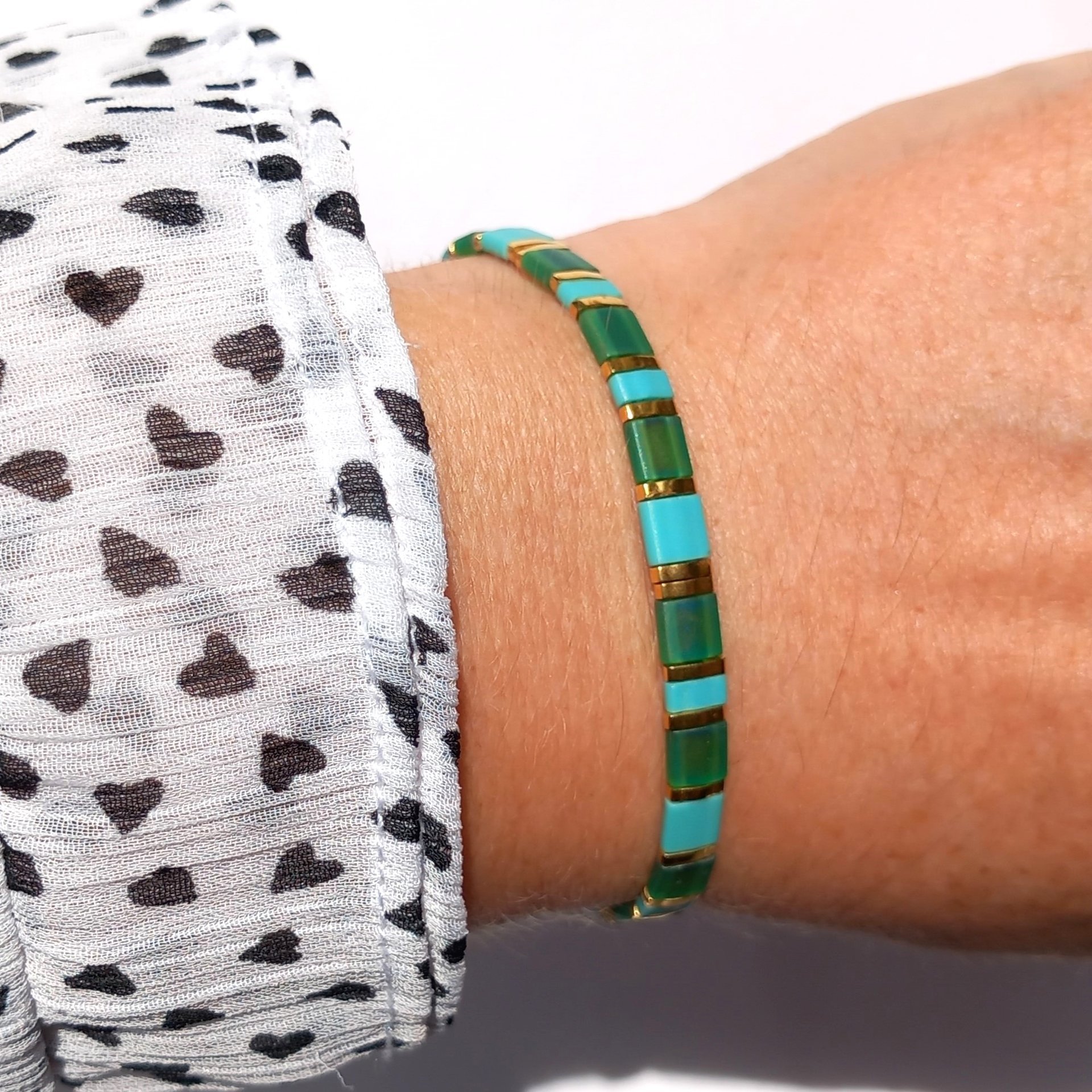 Miyuki tila stretch bracelet, emerald green, turquoise blue and gold-plated tila beads