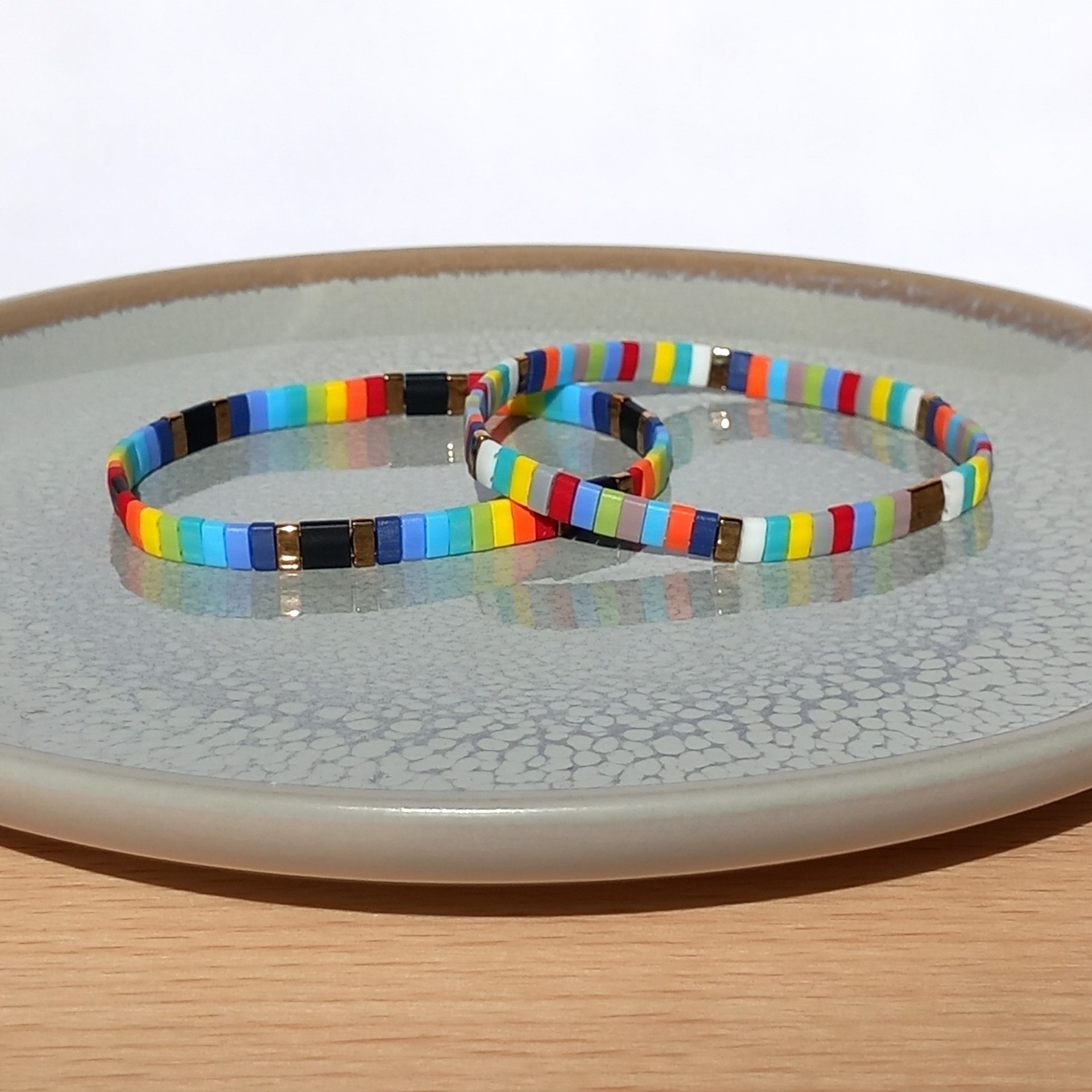 Miyuki tila stretch bracelet set in rainbow and bronze colours, two bracelets with matching designs for stacking or separately, bright summer colours