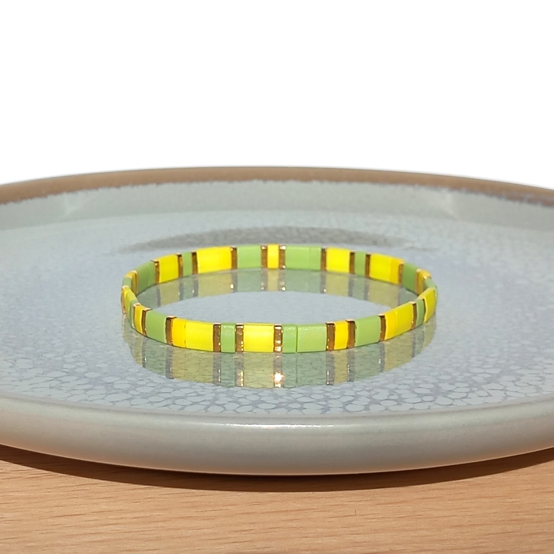 Miyuki tila stretch bracelet in light yellow and chartreuse green colour with gold-plated beads, two bracelets in sunny spring colors