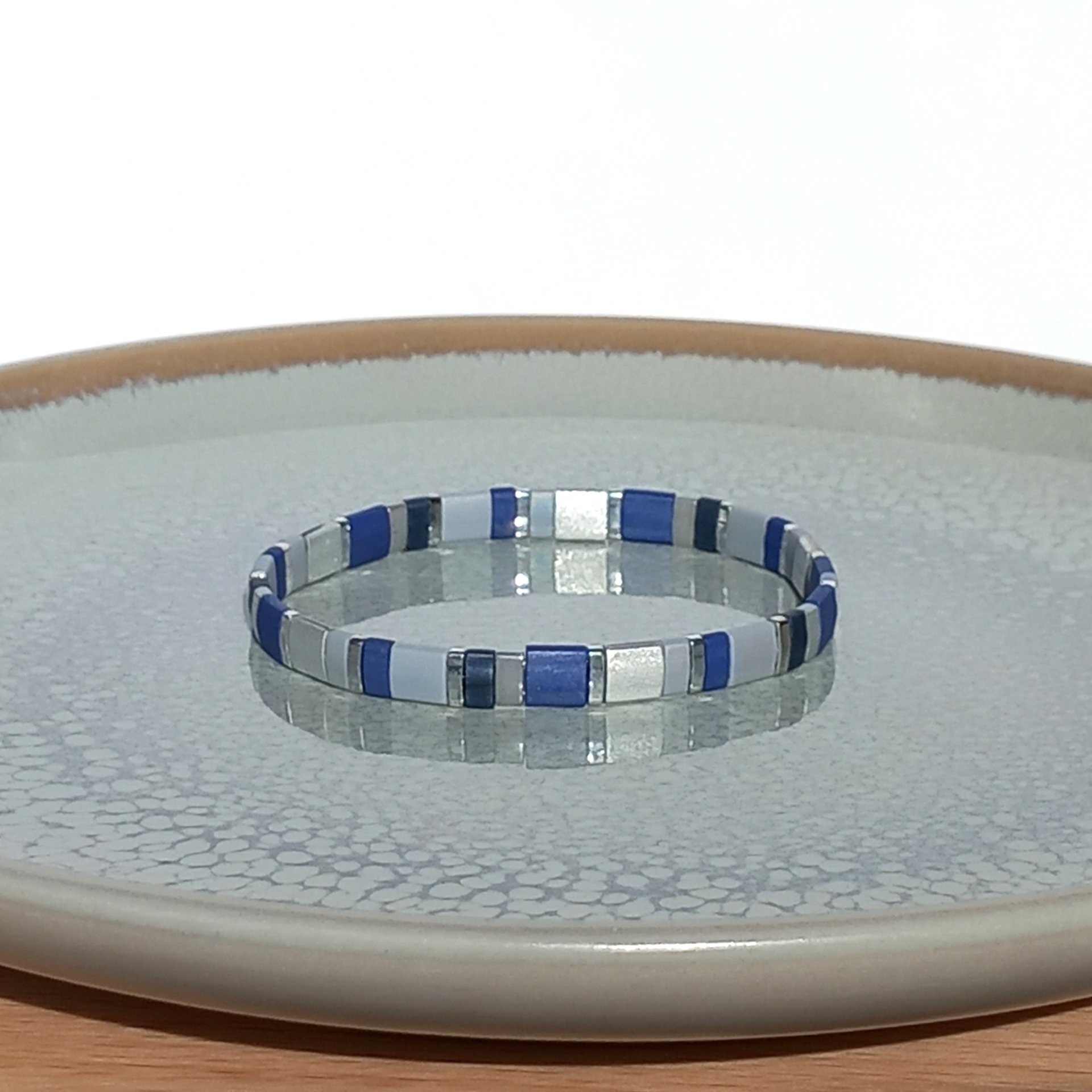 Elegant miyuki beads bracelet strung on transparent stretch cord with tila beads in dark blue, gray and silver color  Handmade with care and attention to detail and made to order at your size