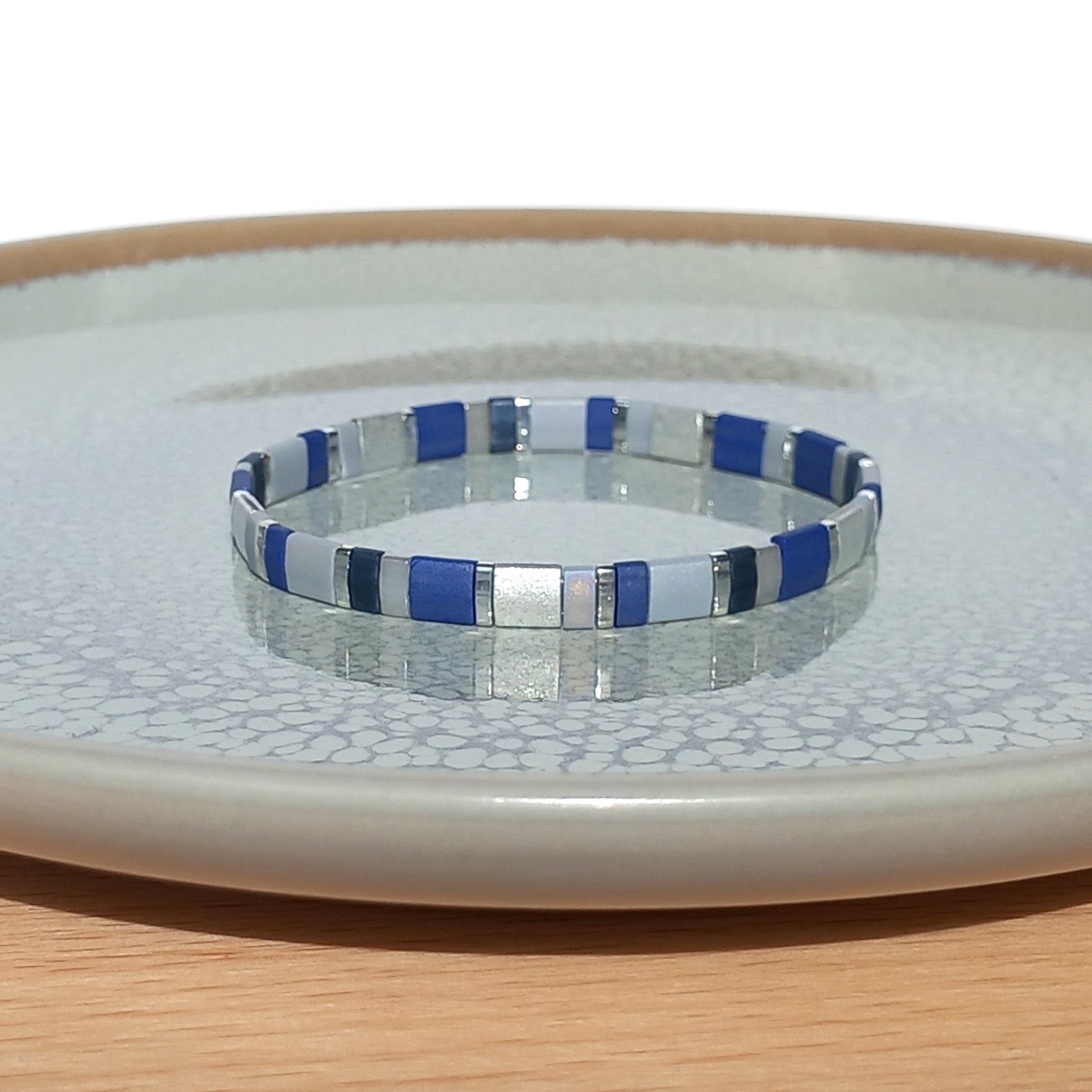 Elegant miyuki beads bracelet strung on transparent stretch cord with tila beads in dark blue, gray and silver color  Handmade with care and attention to detail and made to order at your size