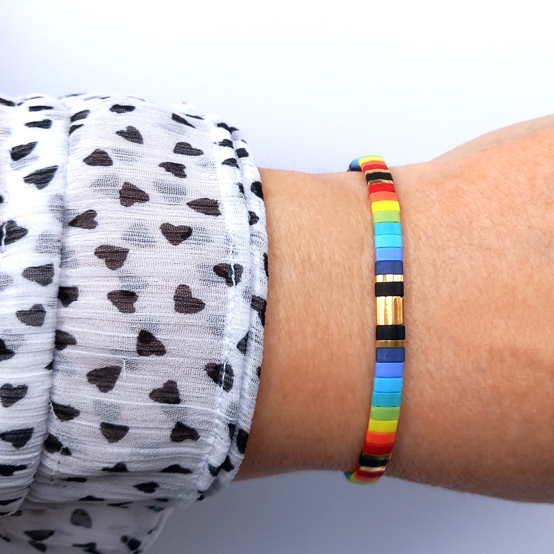 Miyuki tila stretch bracelet in rainbow and gold colours, comfortable boho jewellery