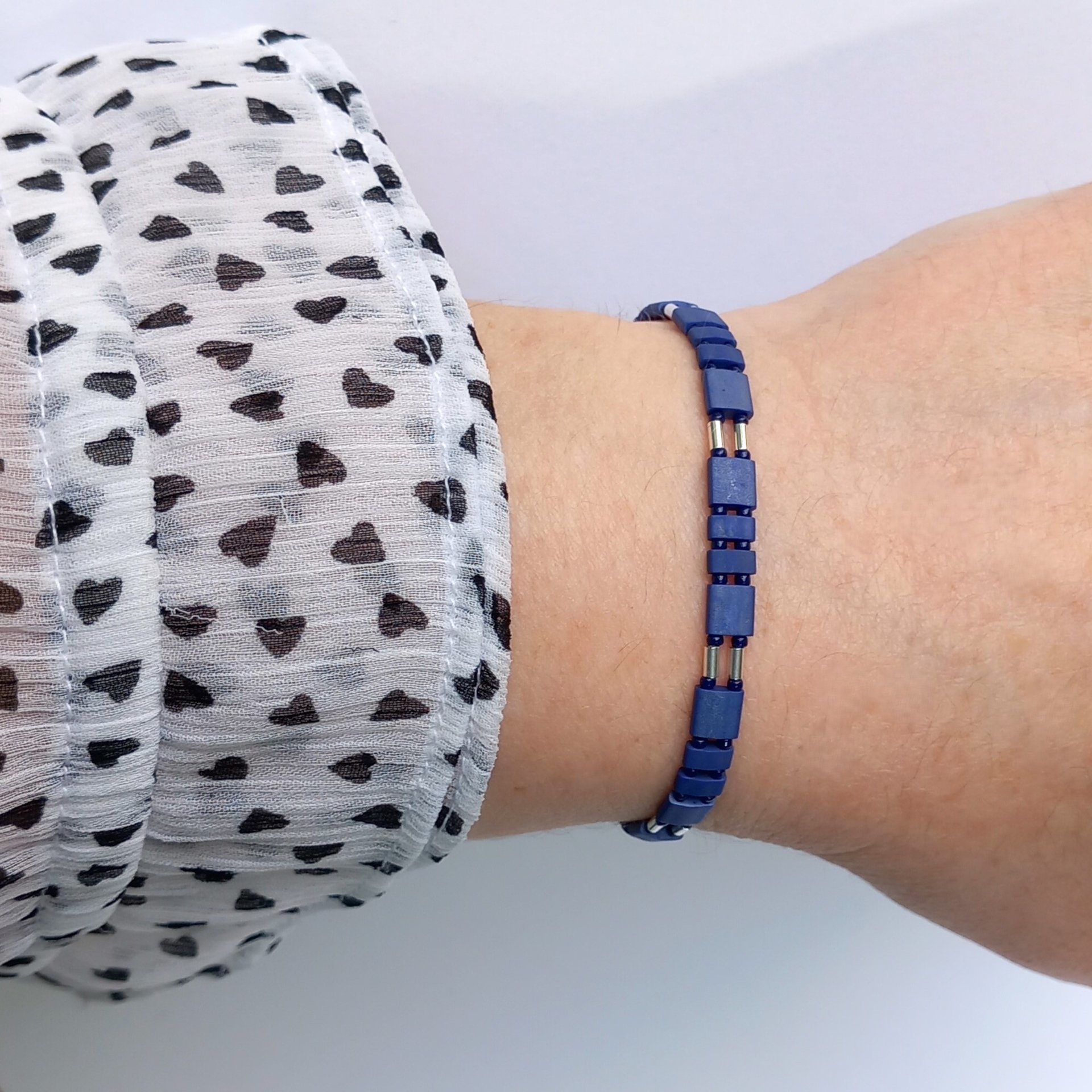 Miyuki tila stretch bracelet in matte dark navy blue and silver, with tila tile beads, tiny rocailles seed beads and thin tube beads