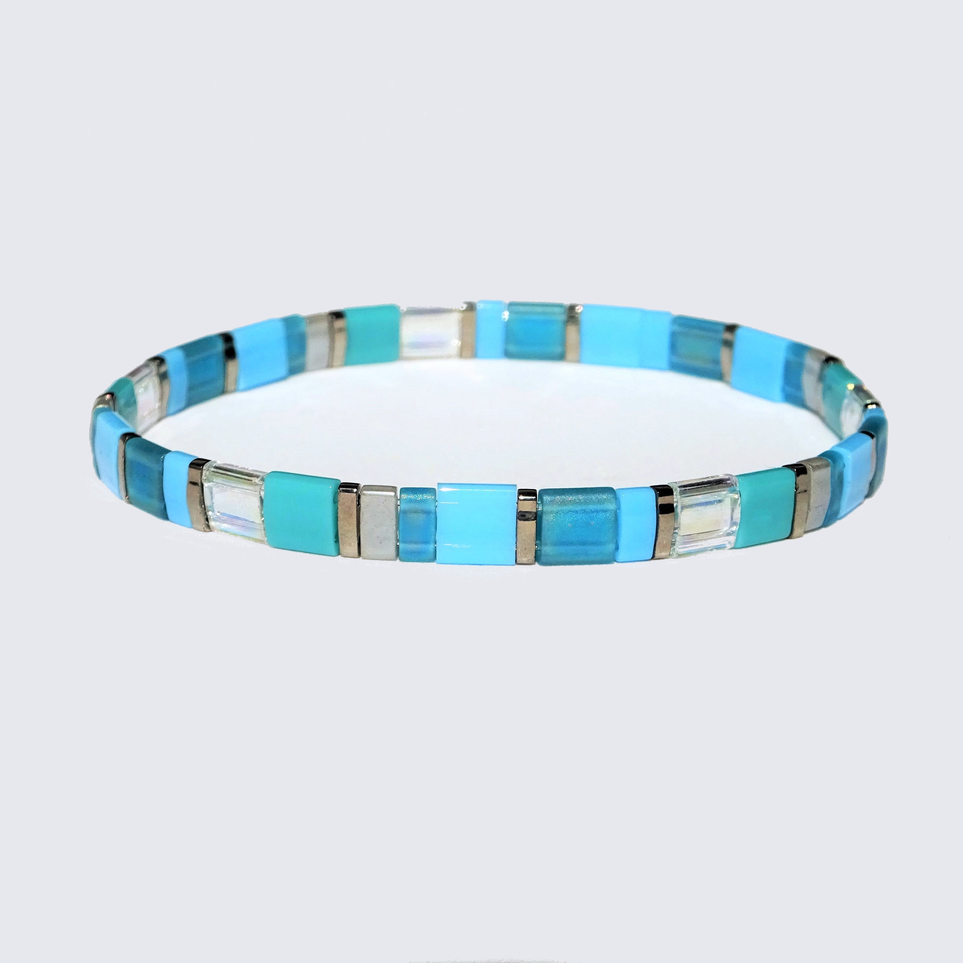 Miyuki tila stretch bracelet, turquoise blue, teal, gray and nickel-plated tila beads