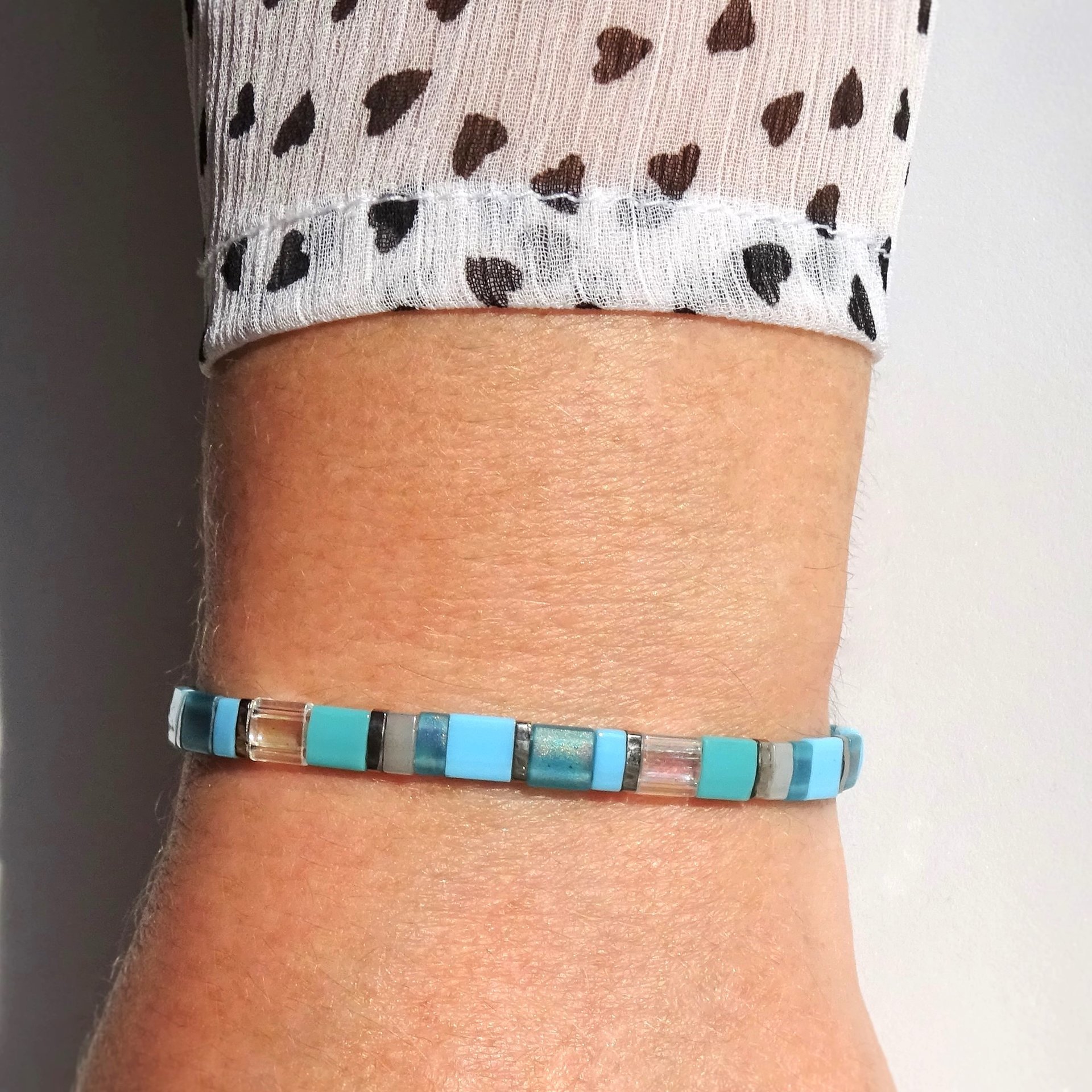 Miyuki tila stretch bracelet, turquoise blue, teal, gray and nickel-plated tila beads