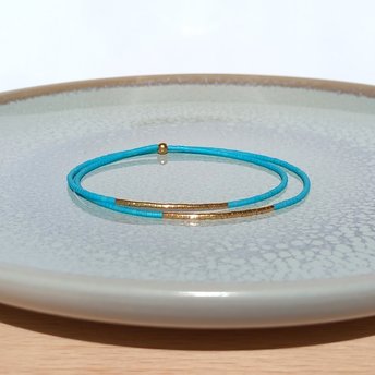 Thin miyuki stretch wrapped bracelet, summer jewelry of tiny blue-green teal beads and gold-plated beads, minimalist, comfortable and light