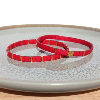 Elegant miyuki tila bracelet set strung on transparent stretch cord  Two bracelets in matching colours; each bracelet is on two strands of stretch cord with shades of matte red and gold colour tila beads with bright red accents  Handmade with care and attention to detail and made to order at your size  Available sizes: 15cm (5.9in), 16cm (6.3in), 17cm (6.7in), 18cm (7.1in)