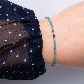 Thin gem bracelet with tiny faceted light blue-green jade and gold-plated tiny beads, stainless steel lobster claw clasp