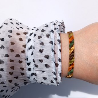 Glass beaded bracelet made with tiny beads in earth tones, stylish adjustable loom bracelet with lobster claw clasp