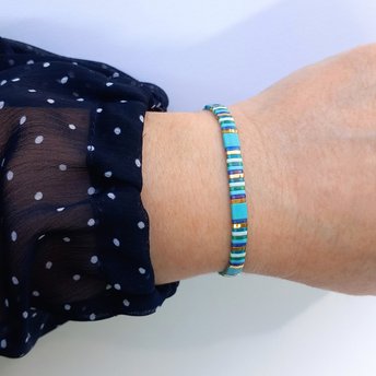 Elegant glass beads bracelet strung on transparent stretch cord in happy summer colours  Two strands with square tile beads in turquoise blue, green, white and gold-plated tila beads  Comfortable for every day but also for your party outfit - wear alone or in combination with other bracelets for a beautiful boho stack  All our jewellery is handmade with care and attention to detail in Amsterdam, The Netherlands. This bracelet is made to order at your size using high-quality Japanese glass tile beads