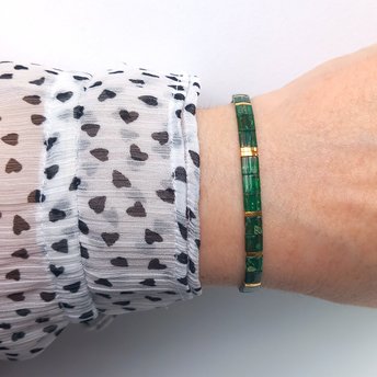 Elegant glass tile beads bracelet strung on transparent stretch cord using Japanese miyuki tila beads known for their high quality and precision  Two strands with square tile beads in picasso emerald green and gold-plated tila beads - elegant and comfortable for everyday use but also for your party outfit