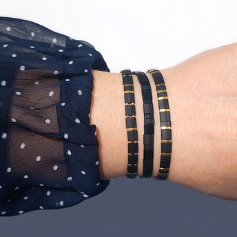 Elegant glass tile bracelet set strung on transparent stretch cord made with miyuki tila beads - perfect for stacking together or to wear separately  Miyuki tila beads are Japanese glass beads known for their high quality and precision. They have flat square shape and are 5mm (0.2in) wide.  Each bracelet is on two strands of stretch cord with black and gold-plated tila beads and tiny seed beads.  The bracelets are comfortable and convenient for everyday use, yet elegant for a special occasion. 